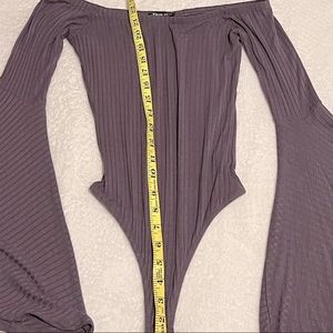 Purple body suit bell sleeves